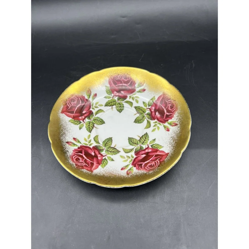 Vintage Paragon Floating Red Roses Gilded Tea Cup and Saucer England